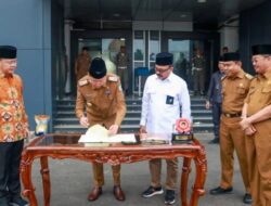 Rohidin Mersyah Teken Kerjasama Pengelolaan Mandiri Gabah Daerah Dengan Bulog