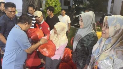 Muhammad Fauzi Salurkan Bantuan Untuk Para Korban Banjir di Lutra